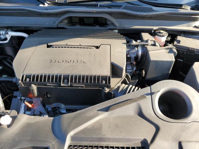 Photo 12 from auction – 2023 HONDA PILOT LX with VIN 5FNYG2H28PB004695