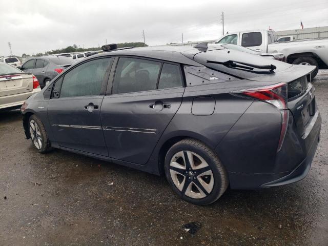 Photo 2 from auction – 2016 TOYOTA PRIUS with VIN JTDKARFUXG3020527