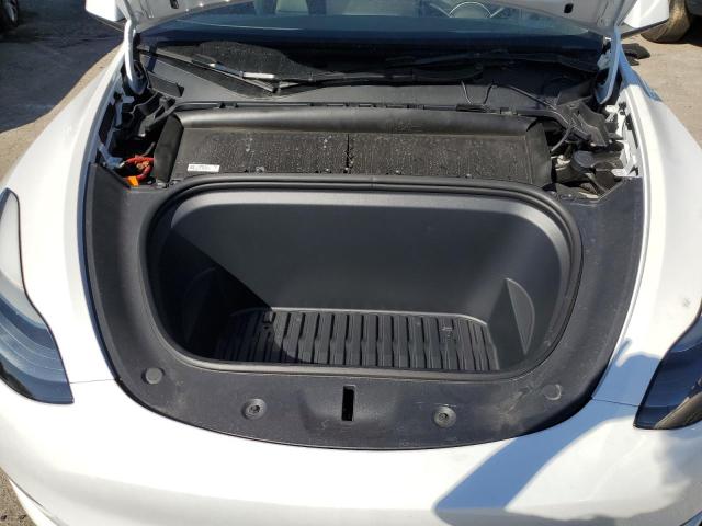 Photo 11 from auction – 2023 TESLA MODEL Y with VIN 7SAYGDEE8PF668783