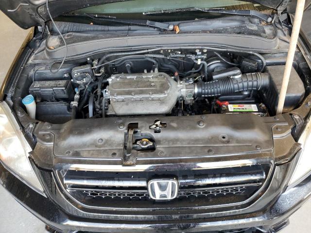 Photo 12 from auction – 2005 HONDA PILOT EXL with VIN 5FNYF18595B008081