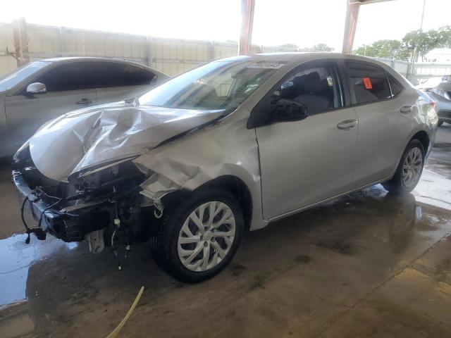 TOYOTA COROLLA L 2019 with VIN 5YFBURHE1KP871077 - Photo from auction