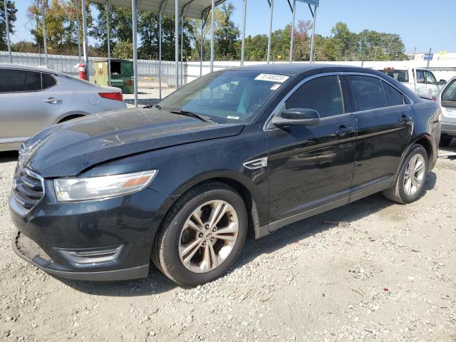 FORD TAURUS SEL 2014 with VIN 1FAHP2E88EG136499 - Photo from auction