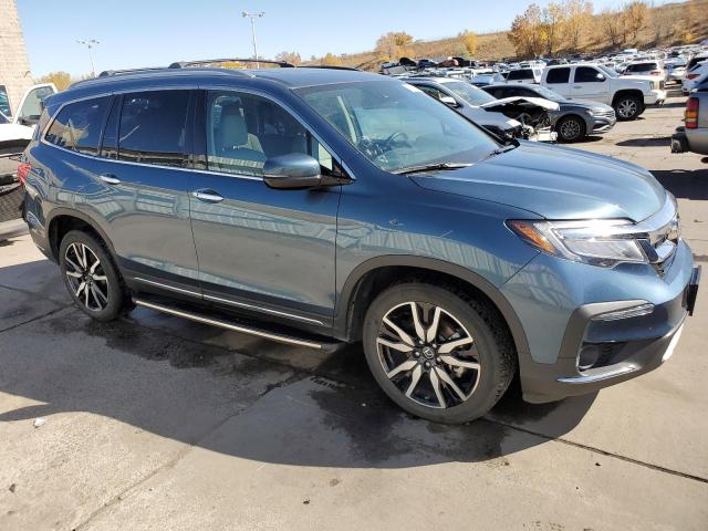 Photo 4 from auction – 2019 HONDA PILOT ELIT with VIN 5FNYF6H03KB012348