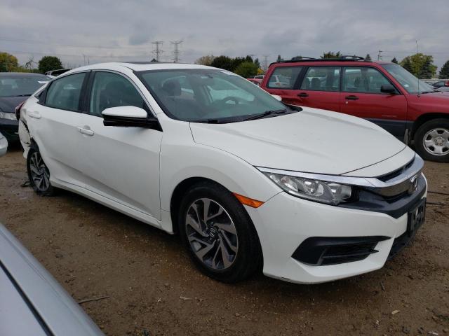 Photo 4 from auction – 2018 HONDA CIVIC EX with VIN 19XFC2F76JE036155