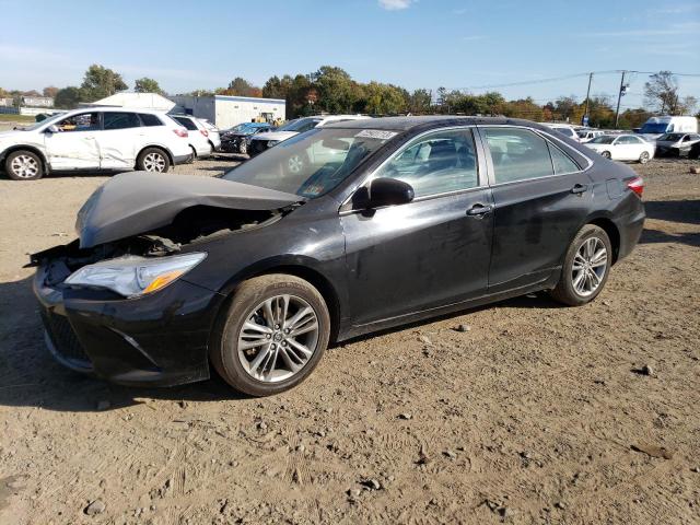 TOYOTA CAMRY LE 2017 with VIN 4T1BF1FK2HU766964 - Photo from auction