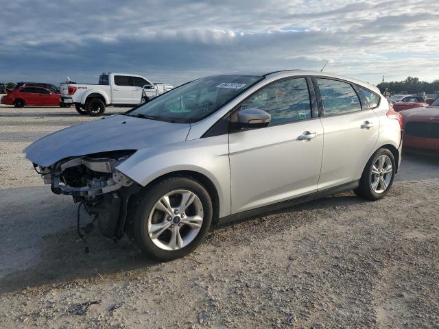 FORD FOCUS SE 2014 with VIN 1FADP3K29EL200514 - Photo from auction