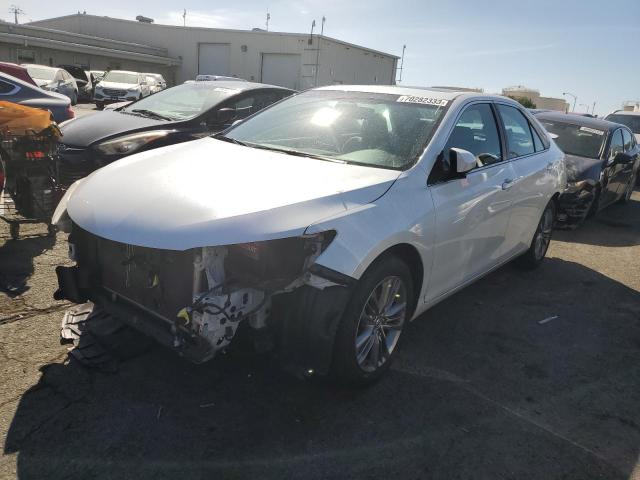 TOYOTA CAMRY LE 2017 with VIN 4T1BF1FK8HU385037 - Photo from auction