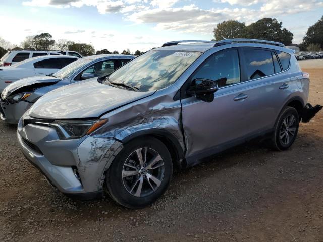 TOYOTA RAV4 ADVEN 2018 with VIN 2T3WFREV1JW424589 - Photo from auction