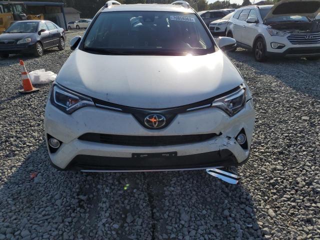Photo 5 from auction – 2018 TOYOTA RAV4 LIMIT with VIN JTMDFREV3JJ204764