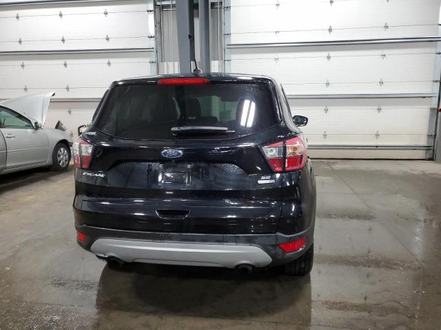 Photo 6 from auction – 2017 FORD ESCAPE SE with VIN 1FMCU9GD0HUD90340