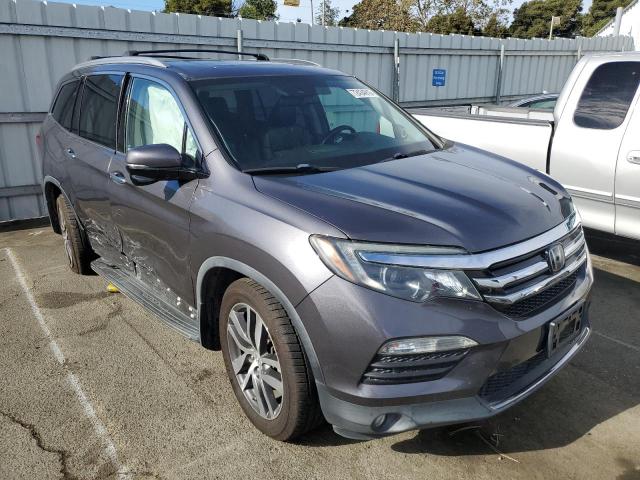 Photo 4 from auction – 2017 HONDA PILOT TOUR with VIN 5FNYF6H99HB095050