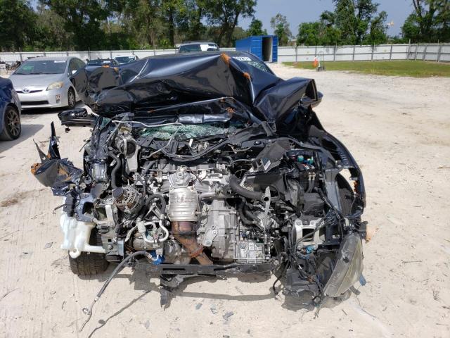 Photo 5 from auction – 2018 HONDA CIVIC EX with VIN 19XFC2F73JE040065