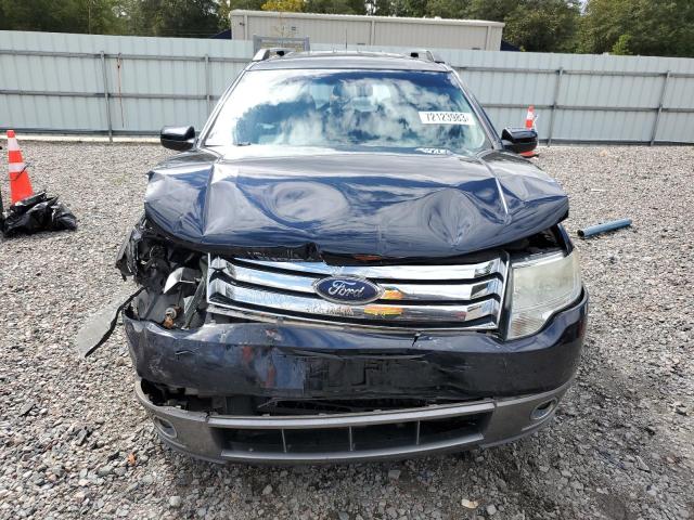 Photo 5 from auction – 2008 FORD TAURUS X S with VIN 1FMDK02W38GA35787
