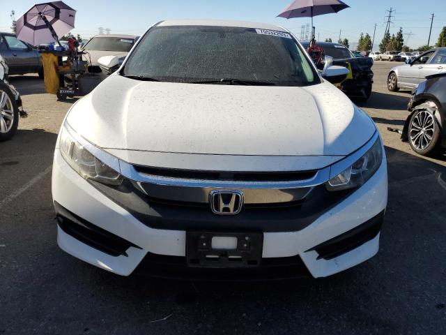 Photo 5 from auction – 2018 HONDA CIVIC LX with VIN 2HGFC2E55JH593404