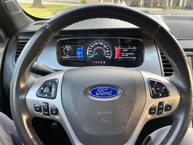 Photo 8 from auction – 2015 FORD TAURUS SEL with VIN 1FAHP2E87FG108467