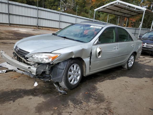 TOYOTA CAMRY LE 2002 with VIN JTDBF32K020026933 - Photo from auction