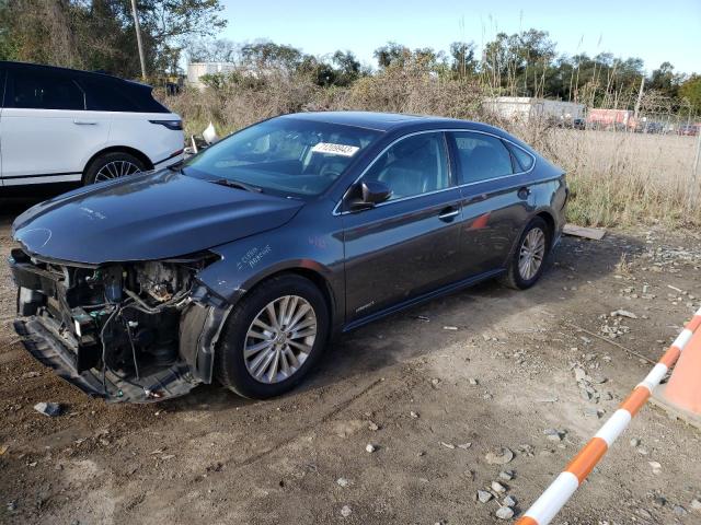 TOYOTA AVALON HYB 2013 with VIN 4T1BD1EB9DU009884 - Photo from auction