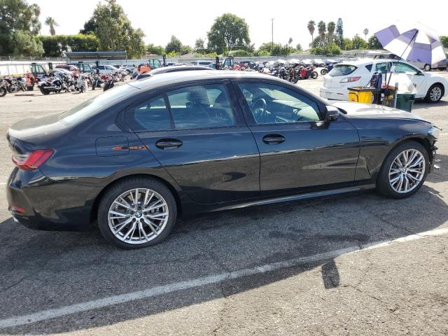 Photo 3 from auction – 2023 BMW 330I with VIN 3MW69FF07P8D56923