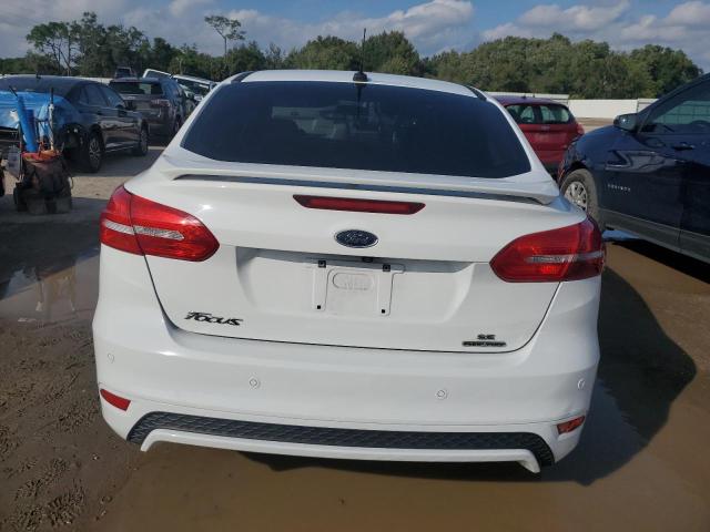 Photo 6 from auction – 2016 FORD FOCUS SE with VIN 1FADP3F24GL242134