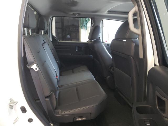Photo 10 from auction – 2014 HONDA RIDGELINE with VIN 5FPYK1F69EB014378