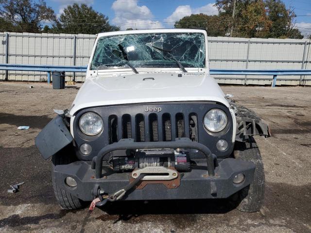 Photo 5 from auction – 2016 JEEP WRANGLER U with VIN 1C4BJWDG2GL142228