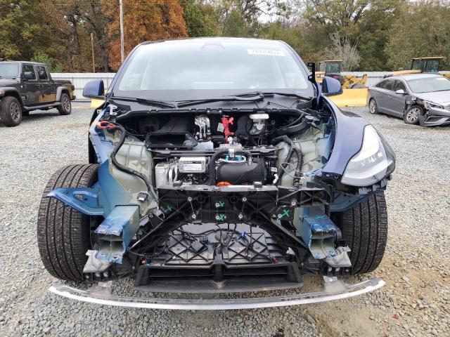 Photo 5 from auction – 2023 TESLA MODEL Y with VIN 7SAYGDEE7PA113384