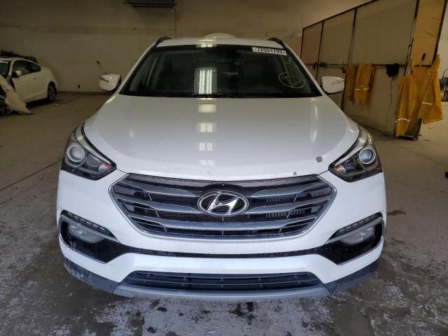 Photo 5 from auction – 2018 HYUNDAI SANTA FE S with VIN 5NMZU4LA2JH090888