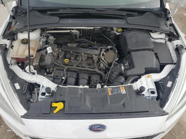 Photo 11 from auction – 2015 FORD FOCUS SE with VIN 1FADP3F23FL217952