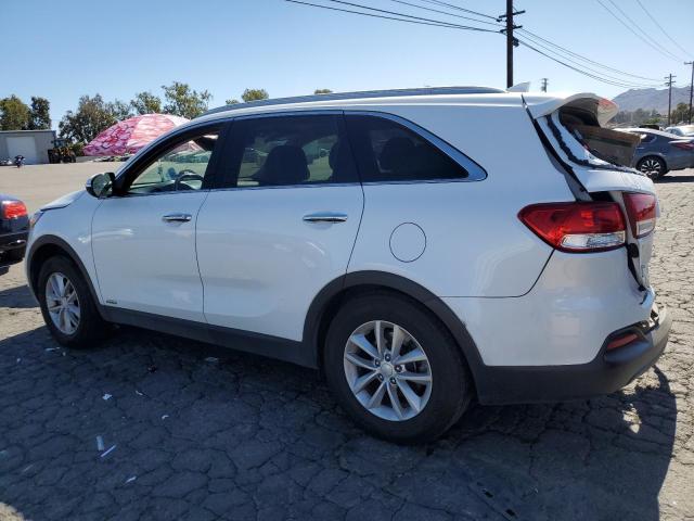 Photo 2 from auction – 2016 KIA SORENTO LX with VIN 5XYPGDA33GG047974