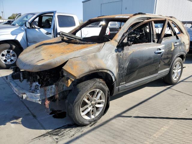 KIA SORENTO LX 2015 with VIN 5XYKTDA75FG605928 - Photo from auction