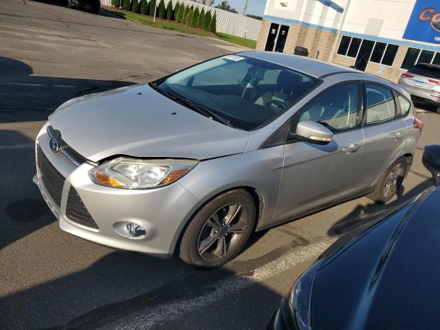 FORD FOCUS SE 2014 with VIN 1FADP3K21EL294999 - Photo from auction