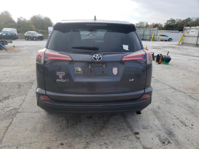 Photo 6 from auction – 2018 TOYOTA RAV4 LE with VIN 2T3ZFREV8JW463404