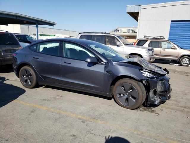 Photo 4 from auction – 2022 TESLA MODEL 3 with VIN 5YJ3E1EB7NF323730