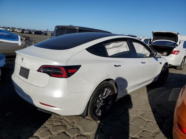 Photo 3 from auction – 2021 TESLA MODEL 3 with VIN 5YJ3E1EA4MF023911