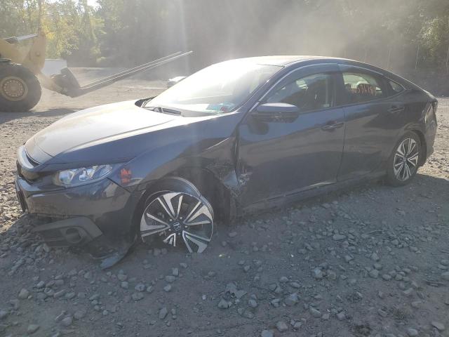 HONDA CIVIC EX 2018 with VIN JHMFC1F38JX028631 - Photo from auction