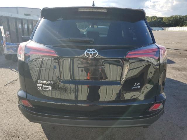 Photo 6 from auction – 2018 TOYOTA RAV4 LE with VIN 2T3BFREV6JW767042