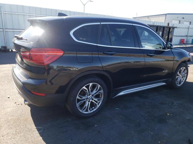 Photo 3 from auction – 2016 BMW X1 XDRIVE2 with VIN WBXHT3C38G5F67352