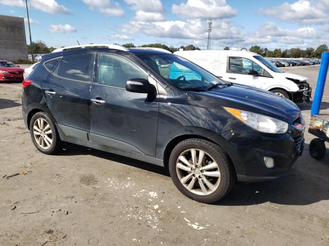 Photo 4 from auction – 2012 HYUNDAI TUCSON GLS with VIN KM8JUCAC6CU480041