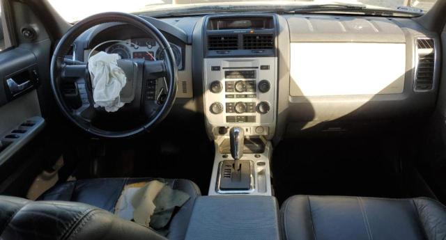 Photo 8 from auction – 2009 MERCURY MARINER PR with VIN 4M2CU87709KJ12974