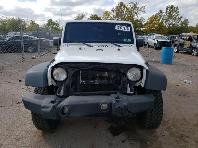 Photo 5 from auction – 2013 JEEP WRANGLER U with VIN 1C4BJWDG9DL705898