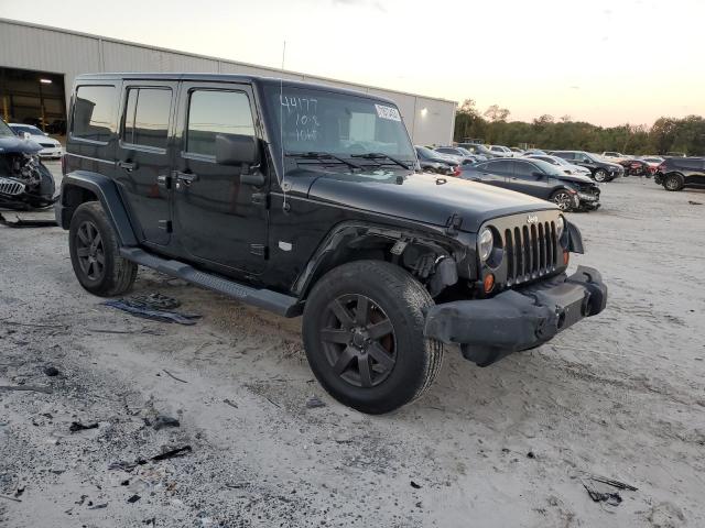 Foto 4 de la subasta – 2011 JEEP WRANGLER U con VIN 1J4BA7H13BL610160