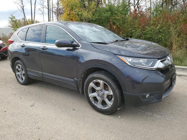 Photo 4 from auction – 2018 HONDA CR-V EXL with VIN 7FARW2H88JE048641