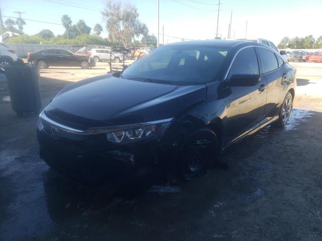 Photo 1 from auction – 2018 HONDA CIVIC LX with VIN 19XFC2F52JE013602
