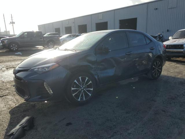 TOYOTA COROLLA L 2019 with VIN 5YFBURHE2KP889071 - Photo from auction