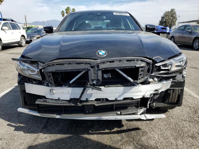 Photo 5 from auction – 2023 BMW 330I with VIN 3MW69FF07P8D56923