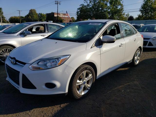 FORD FOCUS SE 2014 with VIN 1FADP3F28EL133284 - Photo from auction