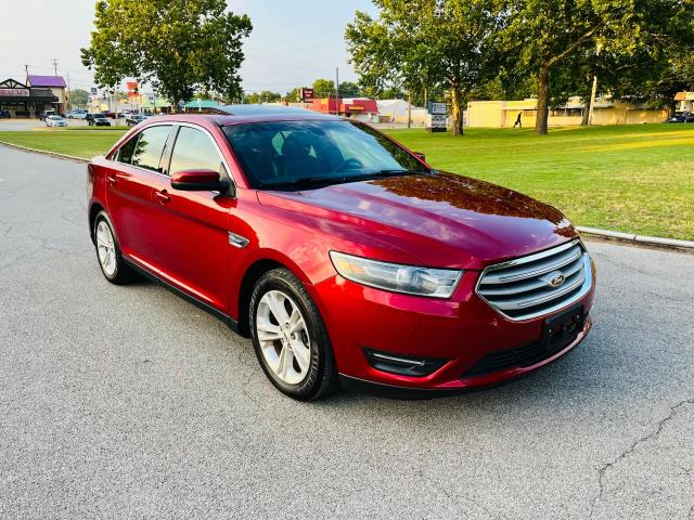 FORD TAURUS SEL 2015 with VIN 1FAHP2E87FG108467 - Photo from auction