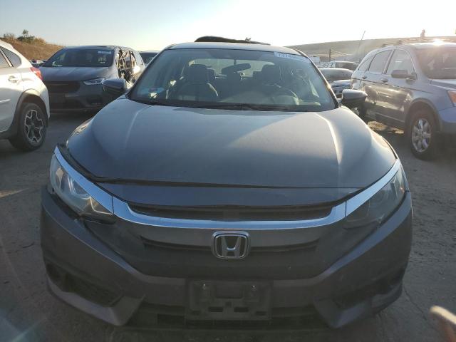 Photo 5 from auction – 2016 HONDA CIVIC LX with VIN 19XFC2F65GE228974