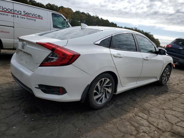 Photo 3 from auction – 2018 HONDA CIVIC EX with VIN 19XFC2F77JE021129