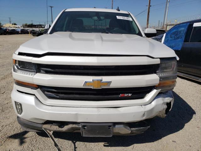 Photo 5 from auction – 2018 CHEVROLET SILVERADO with VIN 3GCUKREC9JG518947